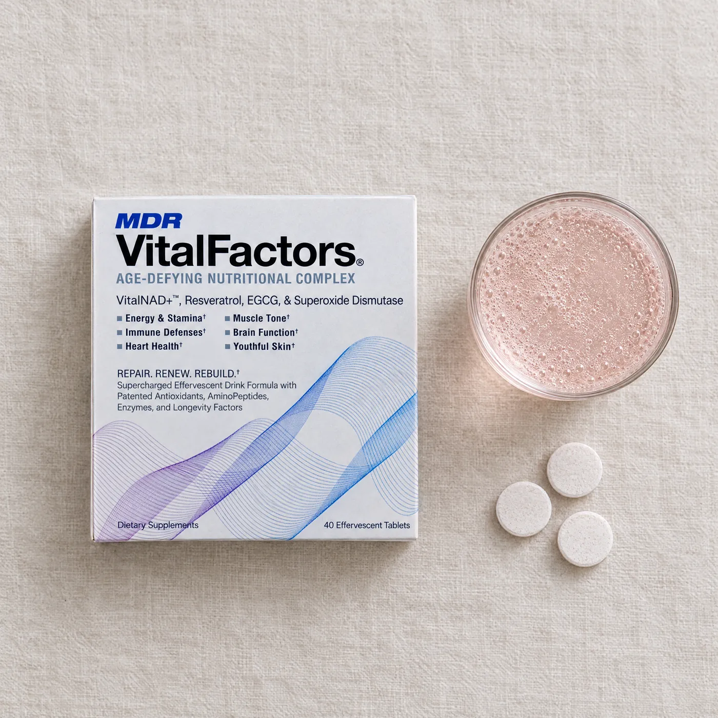 The VitalFactors box from above, with a glass of the drink and three effervescent tablets