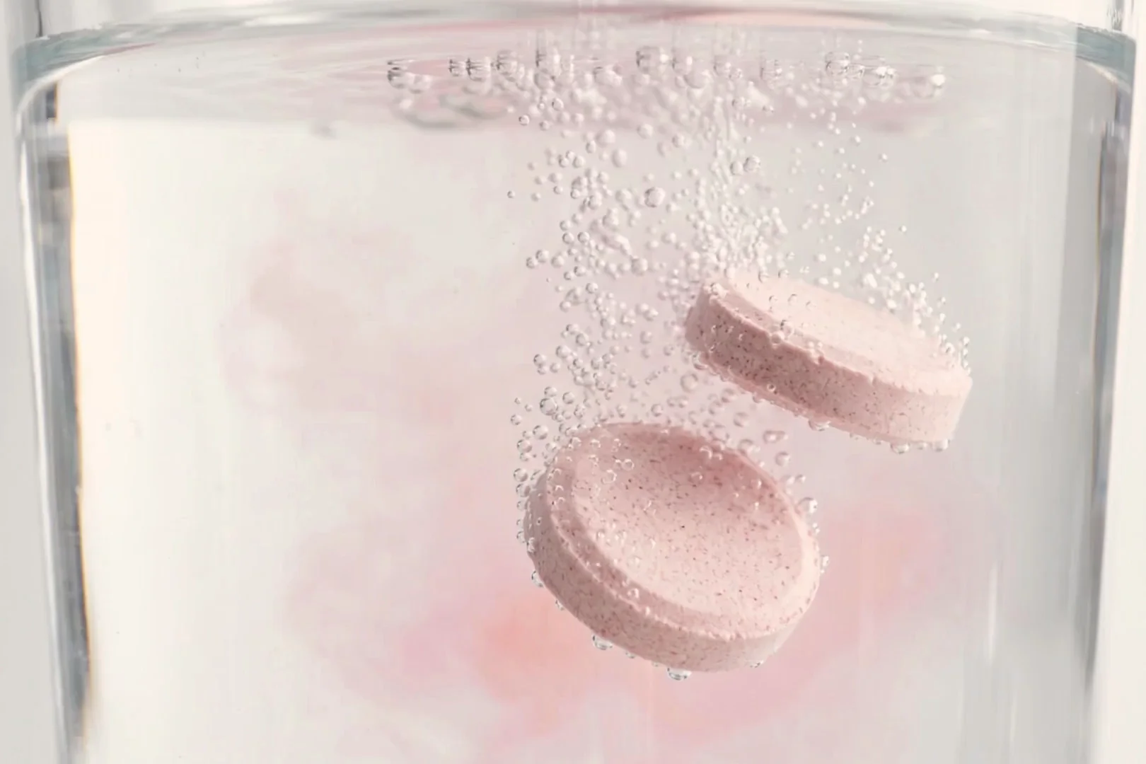 The tablets dissolving in the glass