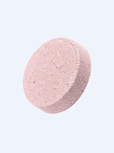 A pink VitalFactors effervescent tablet